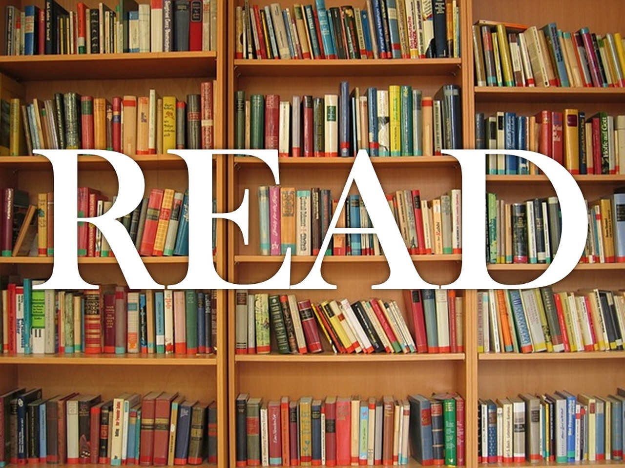 Image of three bookshelves filled with books and the word, "READ" superimposed over it.